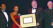 Ntaga Mojapelo (second left) accepts the Autodesk award for effective use of design technology on behalf of ABB South Africa. She is pictured with (from left) Dr Ben Ngubane, minister of arts, culture, science and technology, Errol Ashwell, managing director of award sponsor, Autodesk (Africa), and Roy Marcus, founder of the Technology Top 100 programme